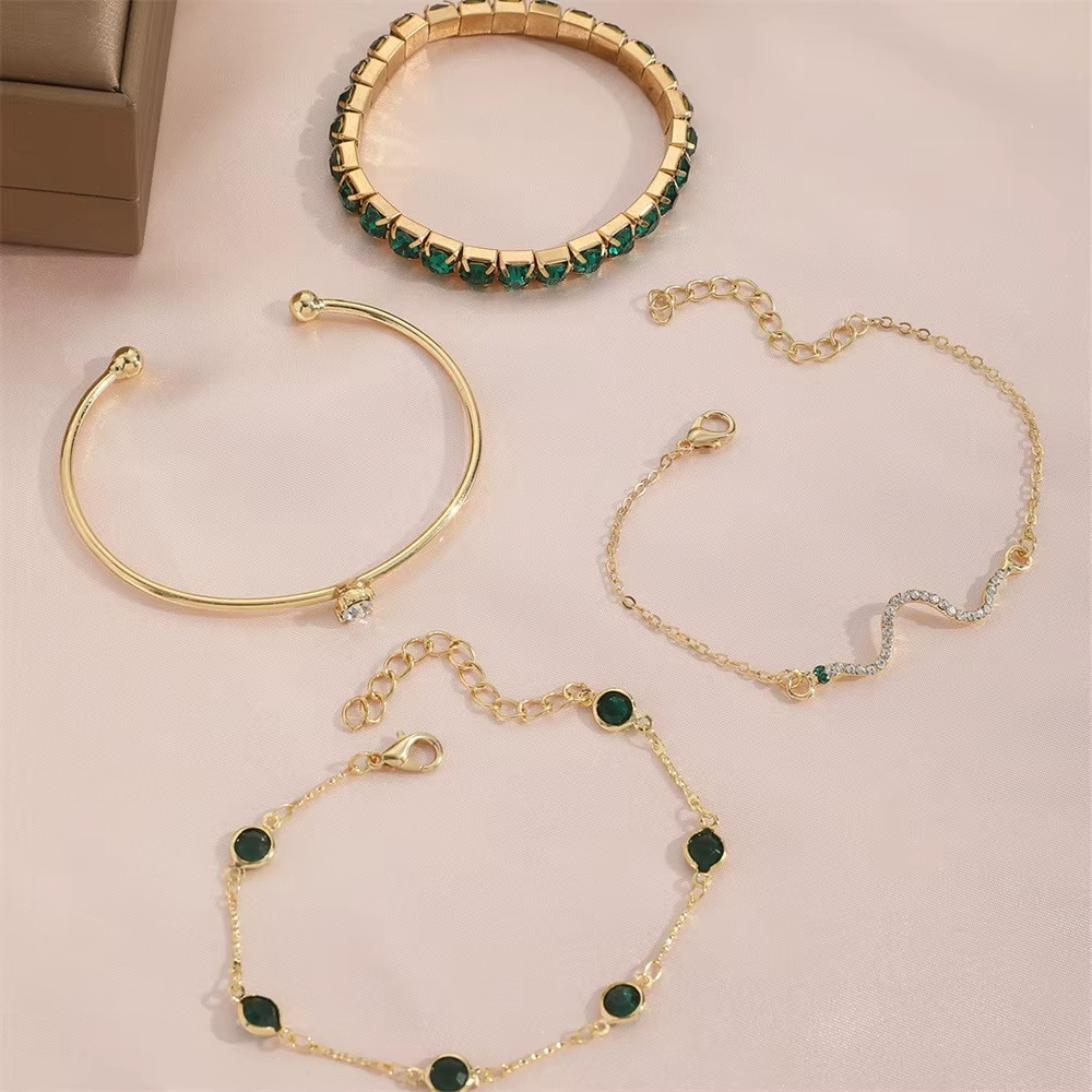 Set de 4 brățări cu cristale de smarald și aur